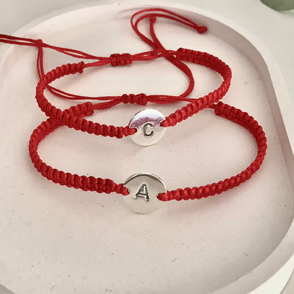 Pulsera trenzada con inicial