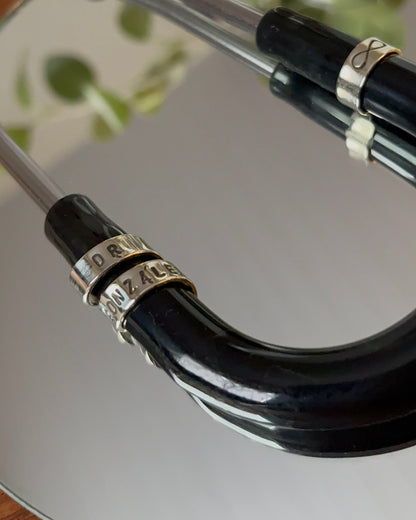 Anillo estetoscopio enrollado