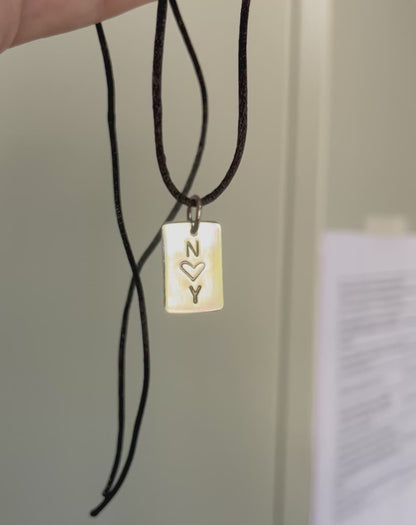 Dije rectangular con iniciales